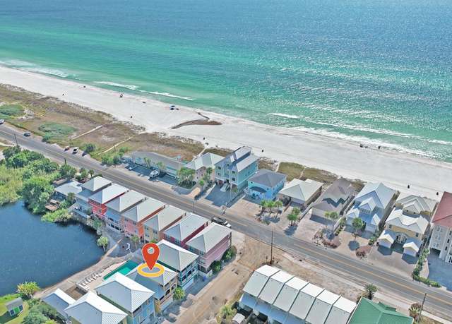 Property at 112 Riviera Dr, Panama City Beach, FL 32413, 4 beds, 3.5 baths