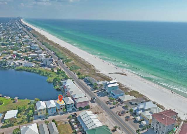 Property at 112 Riviera Dr, Panama City Beach, FL 32413, 4 beds, 3.5 baths