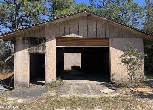 Property at 510 Spikes Rd, Southport, FL 32409
