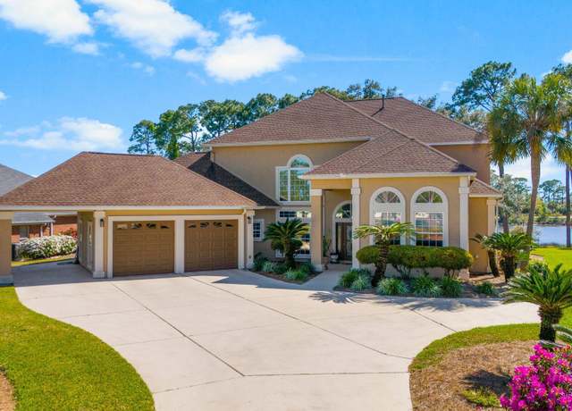 Property at 8017 N Lagoon Dr, Panama City Beach, FL 32408, 4 beds, 2.5 baths