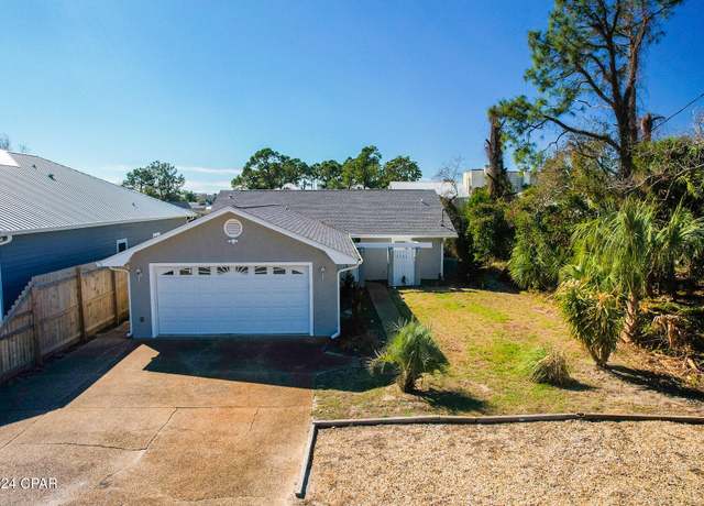 Property at 5701 S Lagoon Dr, Panama City, FL 32408, 3 beds, 2 baths