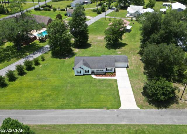 Property at 5373 Ezell St, Graceville, FL 32440, 4 beds, 2 baths