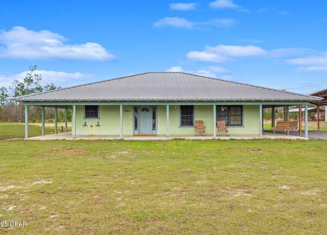 Property at 7910 Gadsden Ave, Southport, FL 32409, 3 beds, 2 baths