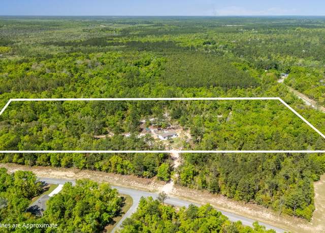 Property at 3790 Country Club Blvd, Chipley, FL 32428, 4 beds, 2 baths