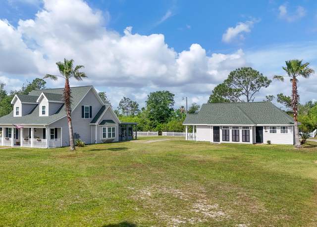 Property at 8033 Marcia Rd, Southport, FL 32409, 4 beds, 3.5 baths