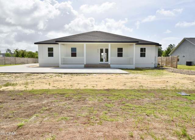 Property at 605 Plantation Dr, Panama City, FL 32404, 4 beds, 3.5 baths