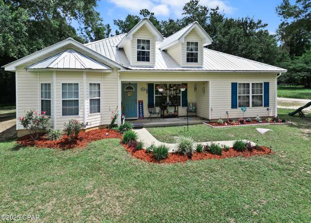 Property at 7496 Clearwater Ln, Grand Ridge, FL 32442, 3 beds, 2 baths