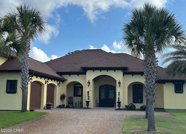 Property at 8714 N Lagoon Dr, Panama City Beach, FL 32408, 4 beds, 3.5 baths