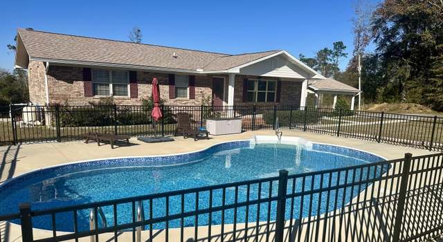 Photo of 7426 Berry Dr, Grand Ridge, FL 32442