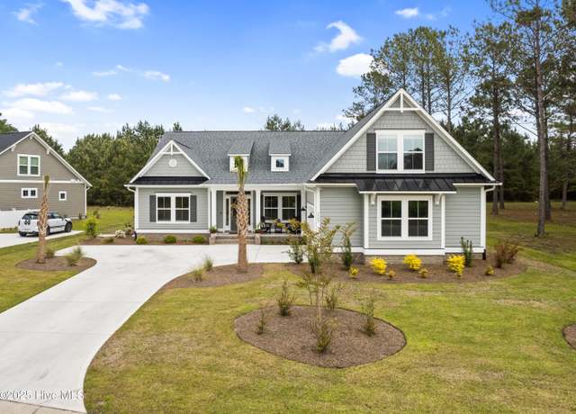 Property at 1067 Tinton Pt SW, Sunset Beach, NC 28468, 4 beds, 3.5 baths