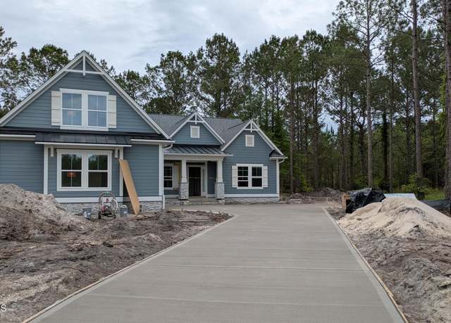 Property at 1075 Tinton Pt SW, Sunset Beach, NC 28468, 3 beds, 3.5 baths