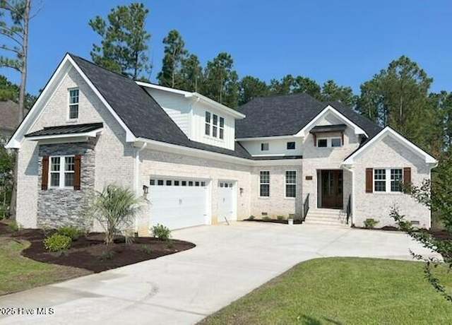 Property at 700 Bertram Ct, Hampstead, NC 28443, 5 beds, 3.5 baths