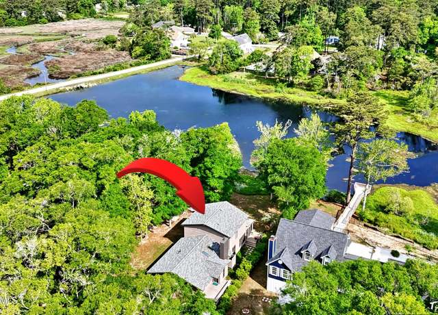 Property at 570 Medcalf Dr SW, Sunset Beach, NC 28468, 4 beds, 4 baths