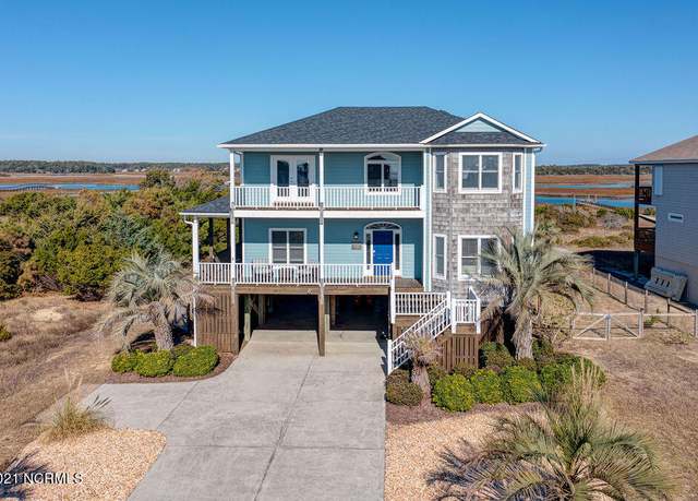 Property at 6614 Kings Lynn Dr, Oak Island, NC 28465, 5 beds, 3.5 baths
