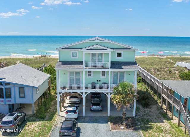 Property at 1047 Ocean Blvd W, Holden Beach, NC 28462, 5 beds, 4.5 baths