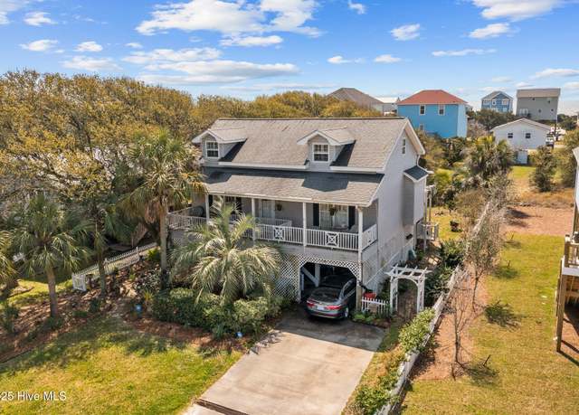 Property at 1613 E Pelican Dr, Oak Island, NC 28465, 4 beds, 3 baths