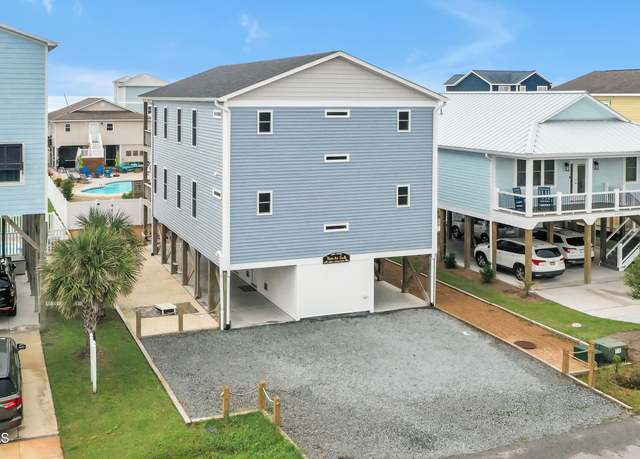 Property at 5205 E Pelican Dr, Oak Island, NC 28465, 6 beds, 6 baths