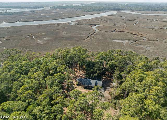 Property at 5903 Dutchman Creek Rd, Southport, NC 28461, 4 beds, 3 baths