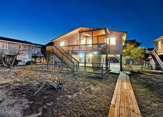 Property at 2021 W Dolphin Dr, Oak Island, NC 28465, 3 beds, 2 baths