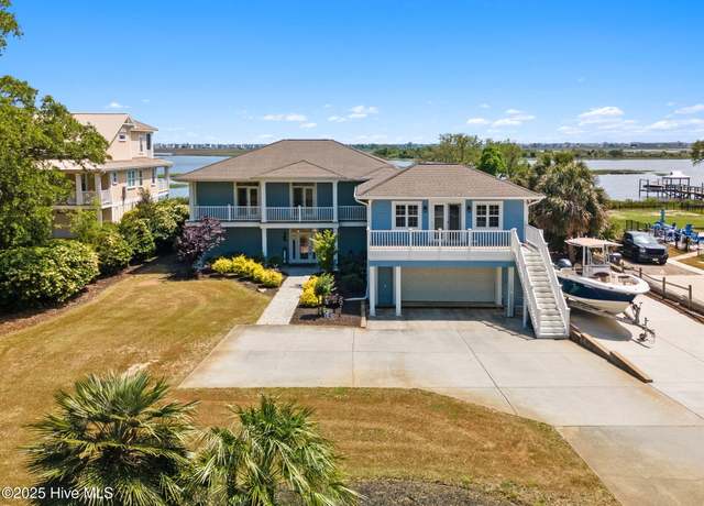 Property at 220 Shoreline Dr E, Sunset Beach, NC 28468, 5 beds, 5.5 baths