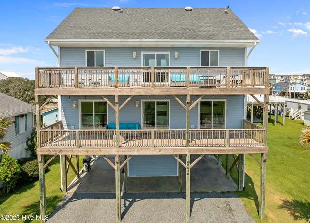 Property at 8020 8th St, Surf City, NC 28445, 5 beds, 3 baths