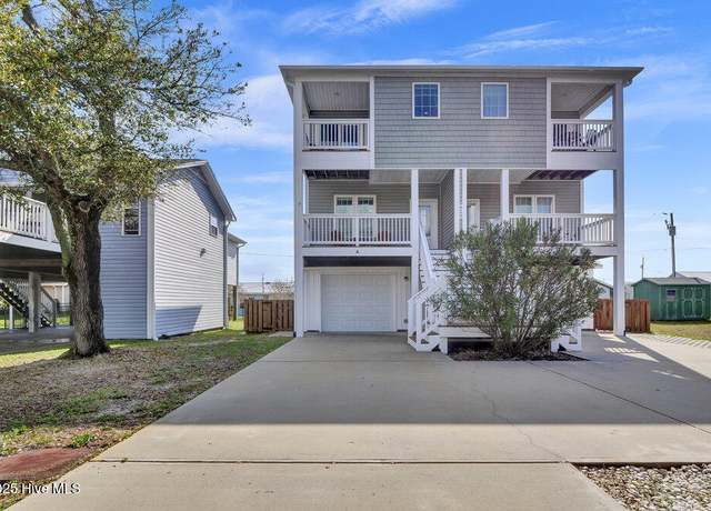 Property at 629 S Fourth Ave Unit A, Kure Beach, NC 28449, 3 beds, 3.5 baths