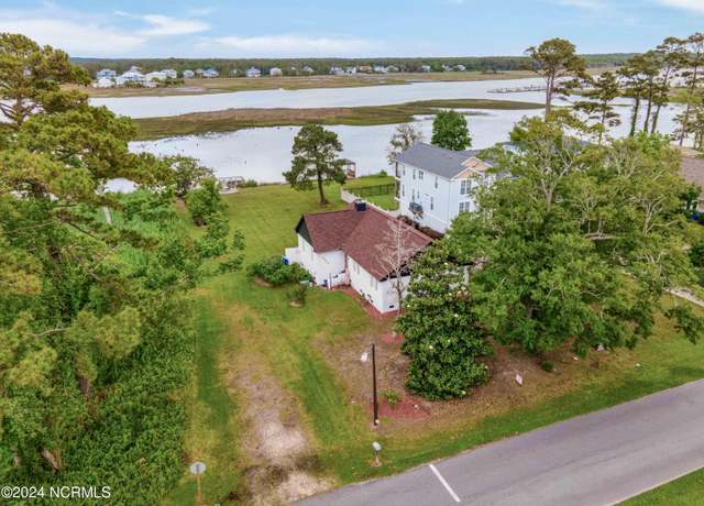 Property at 5802 E Yacht Dr, Oak Island, NC 28465, 4 beds, 2 baths
