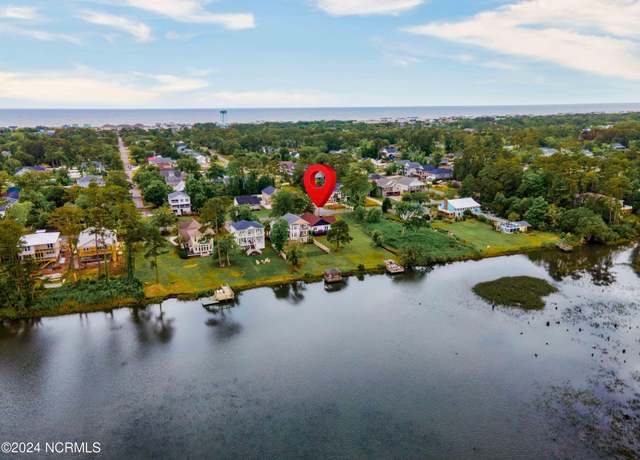 Property at 5802 E Yacht Dr, Oak Island, NC 28465, 4 beds, 2 baths