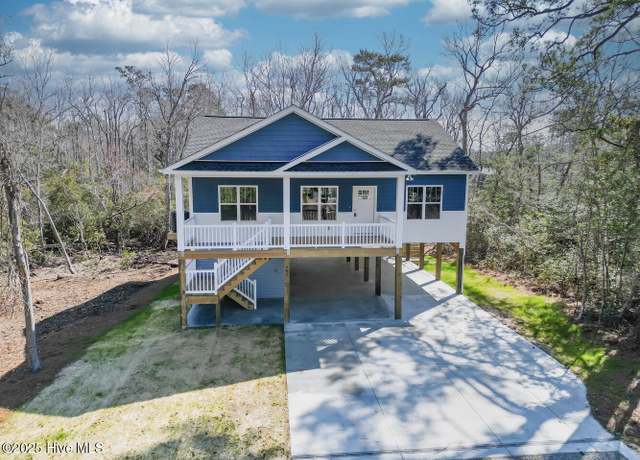 Property at 442 Womble St, Oak Island, NC 28465, 3 beds, 2 baths
