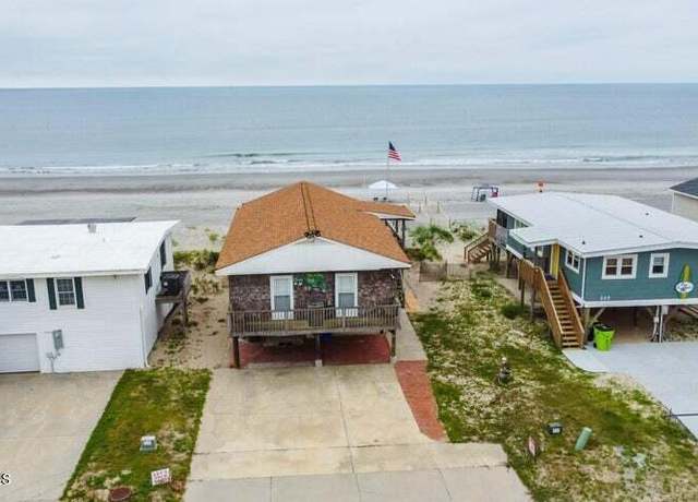 Property at 223 W Beach Dr, Oak Island, NC 28465, 5 beds, 3 baths
