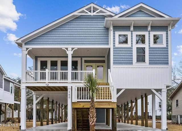 Property at 212 NE 57th St, Oak Island, NC 28465, 4 beds, 3 baths
