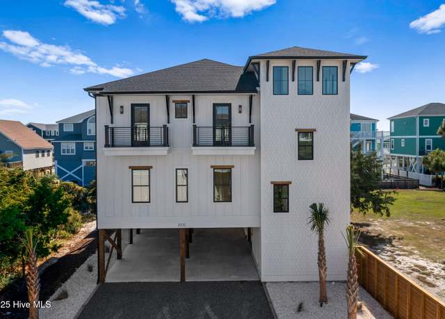 Property at 1031 Coquina Cove Dr, Holden Beach, NC 28462, 5 beds, 4.5 baths