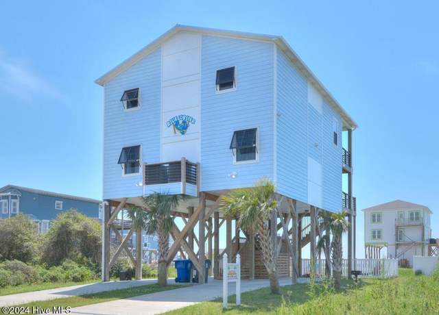 Property at 5207 E Pelican Dr, Oak Island, NC 28465, 5 beds, 3.5 baths