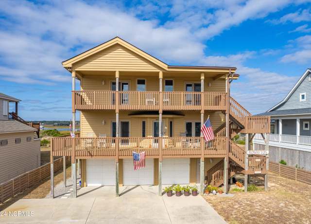 Property at 6610 Kings Lynn Dr, Oak Island, NC 28465, 4 beds, 5.5 baths
