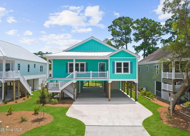 Property at 228 NE 56th St, Oak Island, NC 28465, 4 beds, 3 baths