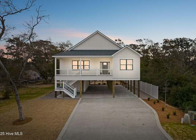Property at 106 NE 64th St, Oak Island, NC 28465, 4 beds, 3 baths