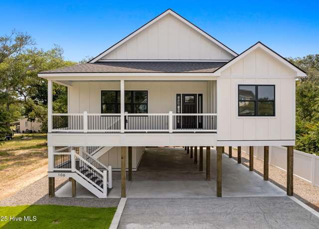 Property at 106 NE 64th St, Oak Island, NC 28465, 4 beds, 3 baths