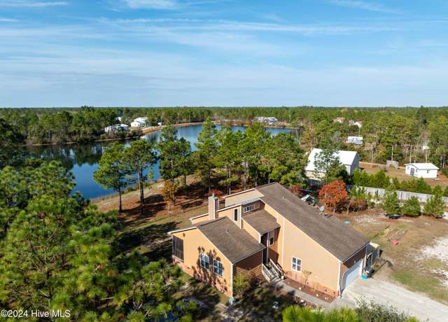 Property at 1034 Milo Ln, Surf City, NC 28445, 3 beds, 2.5 baths