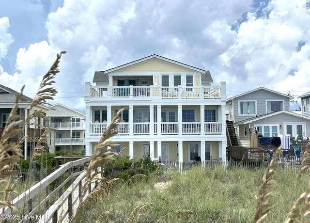 Property at 1106 Fort Fisher Blvd N Unit 1, Kure Beach, NC 28449, 4 beds, 3.5 baths