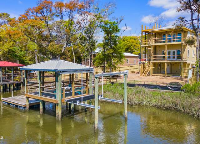 Property at 119 SE 15th St, Oak Island, NC 28465, 4 beds, 3.5 baths