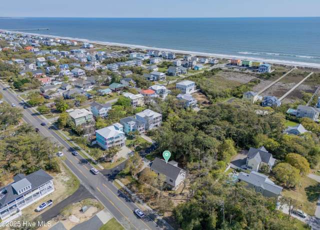 Property at 101 SE 68th St, Oak Island, NC 28465, 4 beds, 3 baths