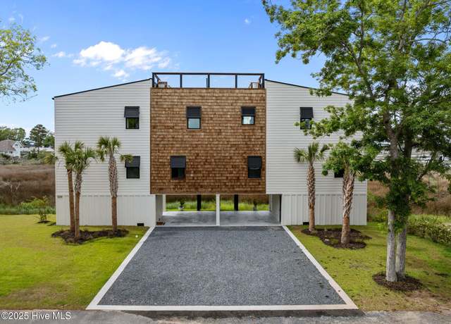 Property at 509 Norton St, Oak Island, NC 28465, 3 beds, 3.5 baths