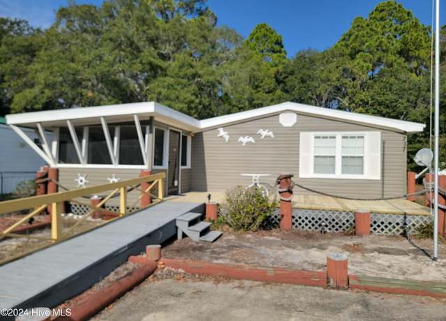 Property at 717 Live Oak Dr, Sunset Beach, NC 28468, 3 beds, 2 baths