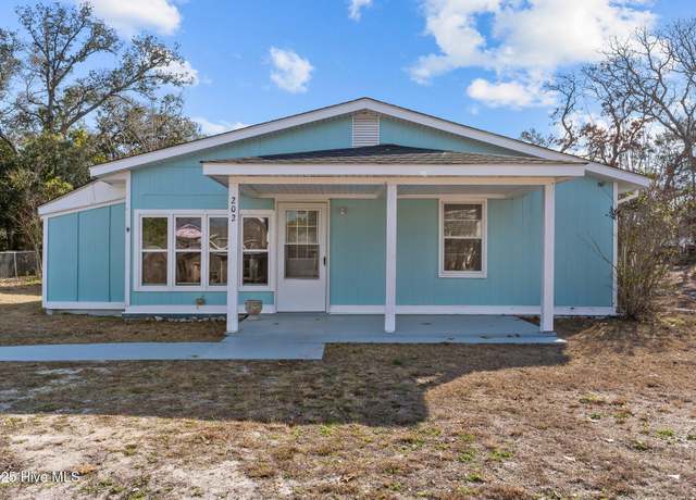 Property at 202 NE 33rd St, Oak Island, NC 28465, 3 beds, 2 baths