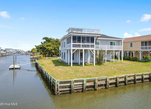 Property at 402 Dolphin St, Sunset Beach, NC 28468, 3 beds, 2 baths