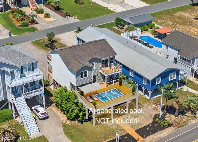 Property at 1116 E Beach Dr, Oak Island, NC 28465, 4 beds, 3 baths