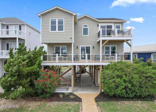 Property at 1116 E Beach Dr, Oak Island, NC 28465, 4 beds, 3 baths