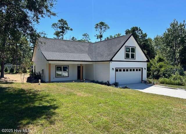 Property at 1996 E Boiling Spring Rd, Southport, NC 28461, 3 beds, 2 baths