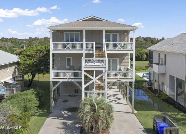 Property at 1404 E Dolphin Dr, Oak Island, NC 28465, 4 beds, 3 baths