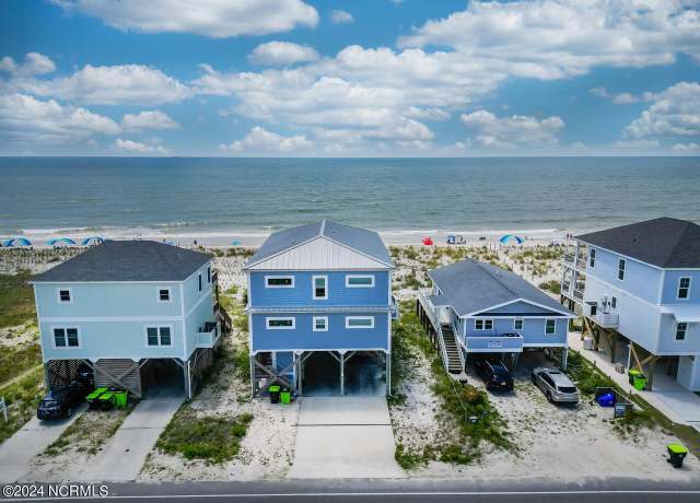 Property at 4619 E Beach Dr, Oak Island, NC 28465, 5 beds, 4.5 baths